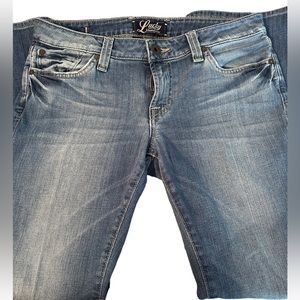 Lucky Brand women’s distressed boot cut jeans. Size 8/29.